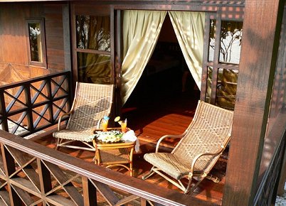 Chairs on a sheltered timber veranda at Mataking Reef Resort